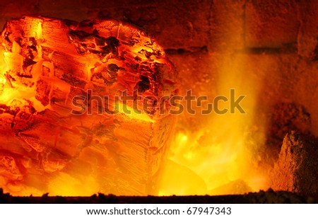 Picture of a fire. Burning coal in fireplace.