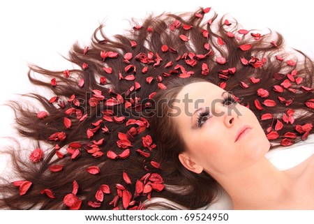 Long Hair With Flowers. stock photo : Beautiful young woman with flowers on her long hair.