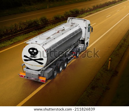 Tanker truck with toxic content riding on the highway.