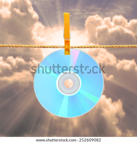 Data storage and sharing concept. CD on the rope.