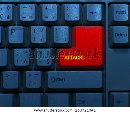 Dirty blue keyboard with red notice Attack. Terrorism online concept.