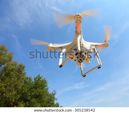PILSEN CZECH REPUBLIC - AUGUST 11, 2015: Drone quadrocopter Dji Phantom 3 Professional with high resolution digital camera (High quality 4K). New tool for aerial photo and video.