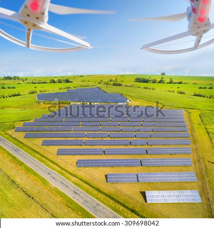 Aerial view to solar power plant.  Use drones to inspect electric infrastructure. Modern technology theme.