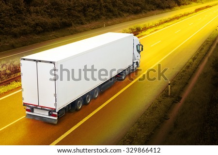 White truck on the highway.