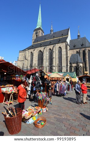PILSEN CZECH REPUBLIC - APRIL 3: unidentified people enjoy the Easter market in the city center on April 3 2012. It is Czech\'s tradition with a very long history dating back to 1296.