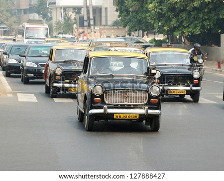 Mumbai,India - December 7 :Mumbai Traffic With Several Unidentified Classical Ambassador Cabs,It\'S Unique Style Of Taxi Service On December 7,2009 In Mumbai,India.Bombay Is Most Populous City In India