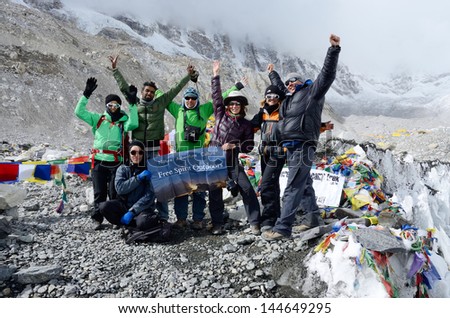 EVEREST BASE CAMP, NEPAL - APRIL 22: Unidentified trekkers at first Everest Base camp on 22 April, 2013 in Everest region, Nepal.This place is final point of the world famous Everest Base Camp Trek