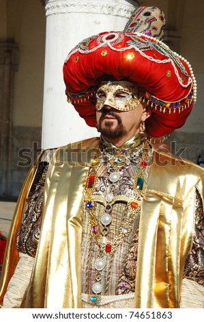 VENICE,ITALY - MARCH 8: Man in Sultan costume at St. Mark\'s Square,Carnival of Venice on March 8, 2011.The annual carnival was held in 2011 from February 26th to March 8th.