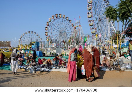 Pushkar, India - November 13:Unidentified People Are Selling Goods At Amusement Park During Traditional Camel Mela In Pushkar On November 13,2013 In Pushkar, Rajasthan, India