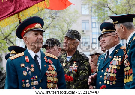 ODESSA,UKRAINE - MAY 9:Old veterans come to celebrate Victory Day in commemoration of Soviet soldiers who died during Great Patriotic War on May 9,2014 in Odessa,Ukraine