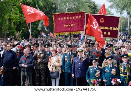 ODESSA,UKRAINE - MAY 9:Veterans of Second World War coming to lay flowers at Eternal Flame in a commemoration of Soviet soldiers in Odessa on May 9,2014 in Odessa,Ukraine