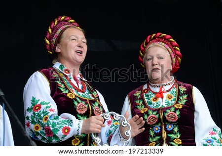 KIEV,UKRAINE - MAY 31:Unidentified senior women singing traditional ukrainian song at Day of Kiev holiday on May 31,2014 in Kiev,Ukraine