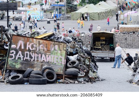 KIEV, UKRAINE - JUNE 19: Barricades with poster saying \