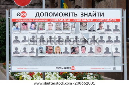KIEV, UKRAINE - JUNE 19: Poster with photos of missing people ,saying \