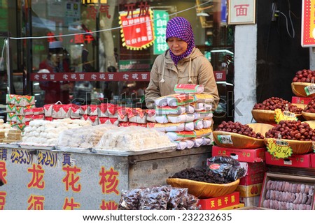On November 3, 2014, now has thousands of years history of Chinese famous food culture blocks in xian - hui street, jostling tourists.