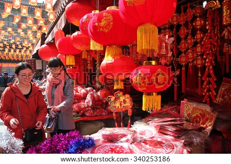 On February 16, 2015, xi 'an people in buying Chinese elements of red lanterns and couplets, New Year mascot. Buy thick Chinese red, to meet the arrival of the Spring Festival and New Year.