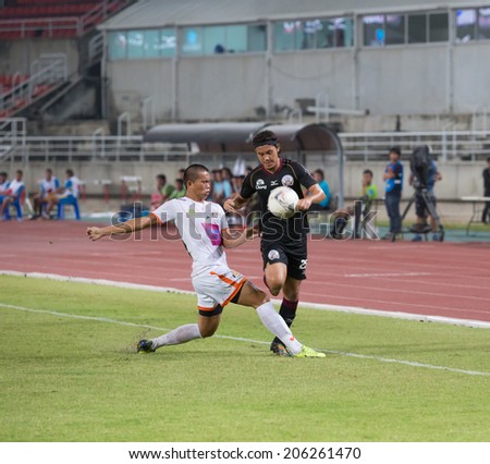PATHUMTHANI THAILAND- JULY 19:A.Muensaman(black) during Thai Premier League (TPL) between Police United(black) vs Sisaket F.C.(white) on July 19, 2014  at Thammasat Stadium in Pathumthani Thailand