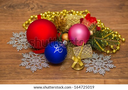 christmas composition with red baubles, golden decorations, pine and berries branches. festive arrangement wit place for your text