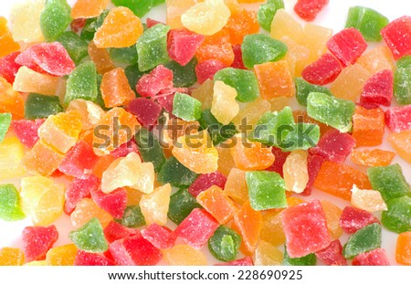 sweet candied dried fruits on a white background