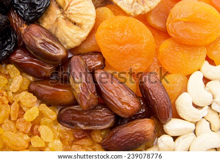 dry fruits pile against white background