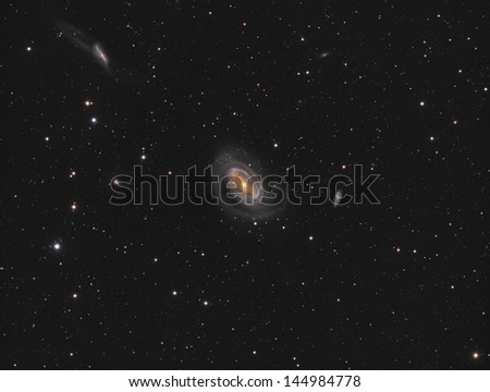 Spiral Galaxy NGC4725 - a barred spiral galaxy about 30 million light years away in the constellation Coma Berenices