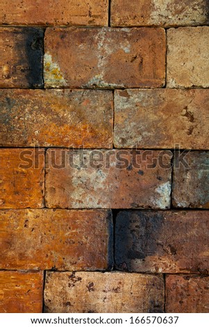 Burnt big brick wall texture background.