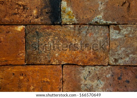 Burnt big brick wall texture background.