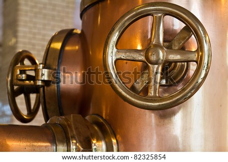 stock-photo-copper-distillery-tanks-in-brewery-82325854.jpg