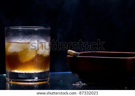 Whiskey with ice cubes Stock Photo by Givaga