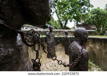 STONE TOWN, ZANZIBAR - OCTOBER 27: Slavery monument with sculptures and chains near the former slave trade place on October 27, 2008 in Stone town, Zanzibar.