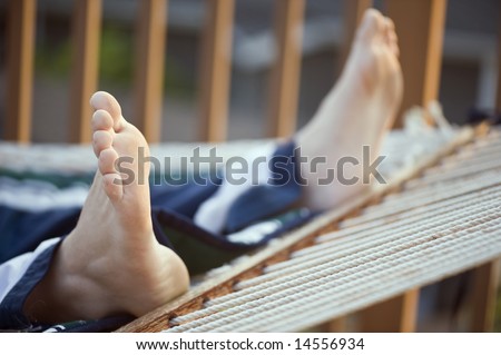 Feet propped up resting in a hammock!