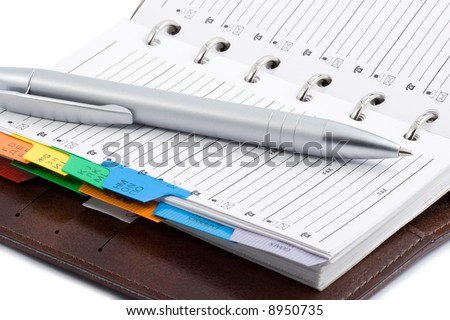 pocket planner and pen isolated