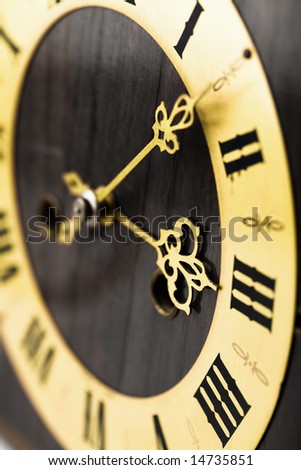antique clock dial with Arabic numerals