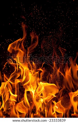 flame and sparks isolated over black background