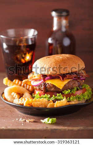 bacon cheese hamburger with beef patty tomato onion