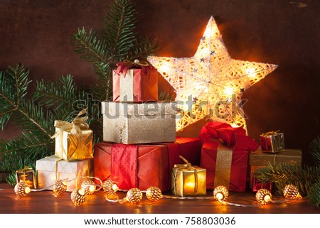 red and golden christmas gift box and decoration light