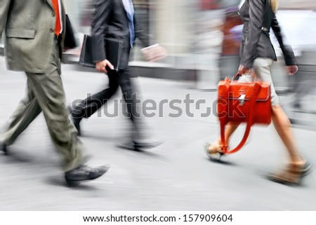 Business People At Rush Hour Walking In The Street, In The Style Of Motion Blur