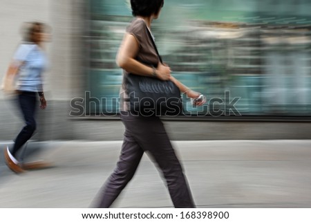 shopping in the city in motion blur