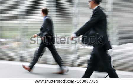 image of business people in the street and modern style with a blurred background