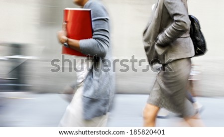 abstract image of business people in the street and modern style with a blurred background