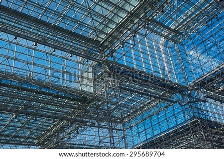 architecture blue glass ceiling inside contemporary business hallway