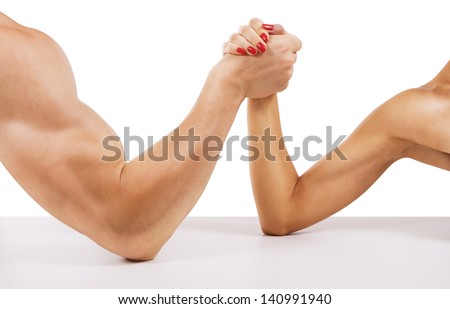 A Man And Woman With Hands Clasped Arm Wrestling, Isolated On White