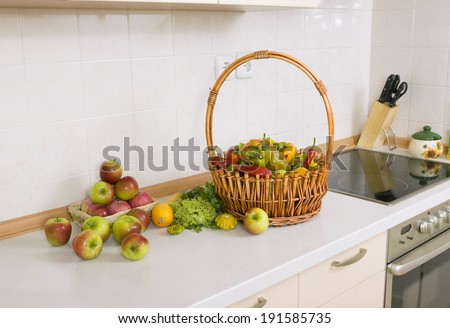 lot of vegetables and fruits on the kitchen table