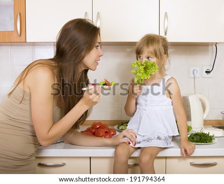 girl with no appetite - kid does not want to eat salad