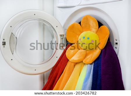 Washing machine, toy and colorful laundry to wash