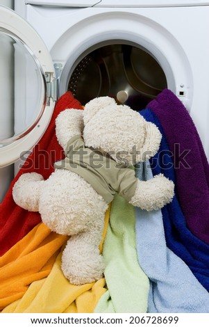 Delicate washing soft toys: Washing machine, toy and colorful things to wash