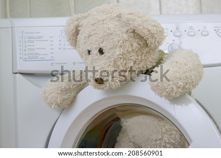 fluffy children\'s toy in the washing machine