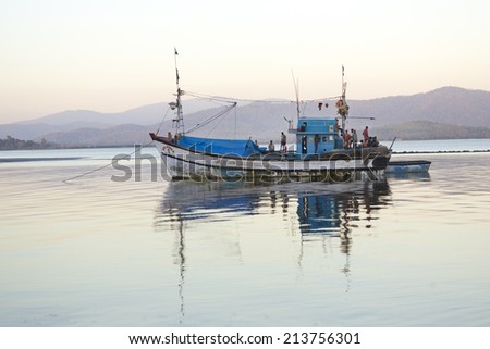 GOKARNA,INDIA - Feb 27: Indian fishing boat, India on Feb 27, 2014. In India poor people usually engaged in Fishing. Many people use the same old equipment, inherited from their ancestors.