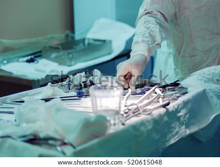 surgeon and hand  tools