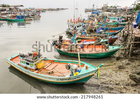 Phetchaburi -  September 7 : Fishing boats stand in the harbor to transport fish from the boats to the market  which 90% of  foreign workers is Burmese. September 7, 2014  Phetchaburi Thailand.
